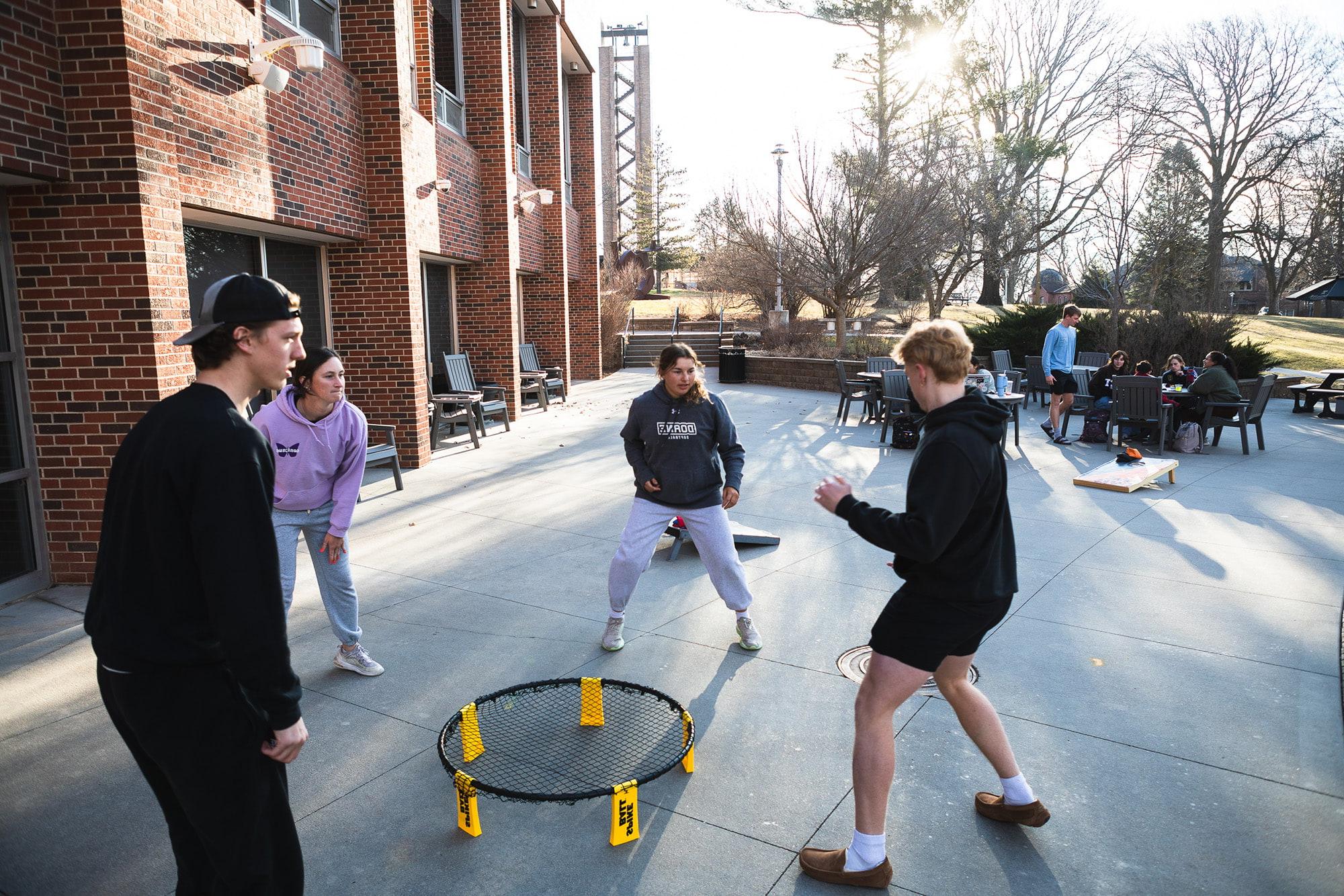 Doane students playing net ball.